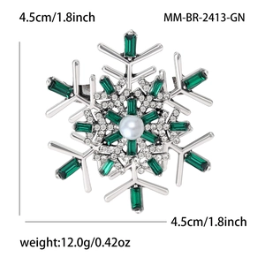 Elegant silver snowflake brooch with green gems and white pearl, 4.5cm diameter size