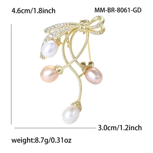 Elegant gold bow brooch with freshwater pearls and zircon accents for women's blazer