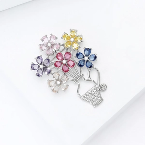 Detail of flower basket brooch with pear-cut colorful zircons and micro-pave setting