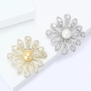 Vintage floral brooch with freshwater pearls and sparkling zircon in gold and silver finish