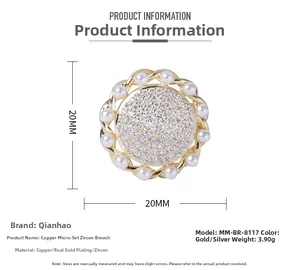 Detail showing a 20mm sunflower brooch with zircons and pearls in gold finish