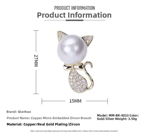 Detail showing dimensions of micro-pave cat brooch with pearl head and gold finish
