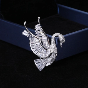Detail shot of swan brooch with baguette-cut cubic zirconia and silver-tone finish