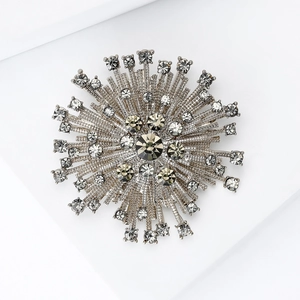 Elegant starburst brooch with Czech crystals and grey stones for women's suit accessories