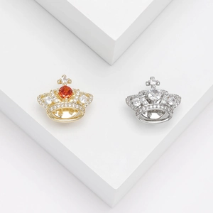 Luxury crown brooch with micro-paved cubic zirconia in gold and silver finish