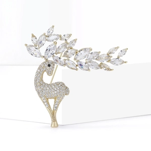 Elegant gold deer brooch featuring sparkling zircons and marquee crystal antlers