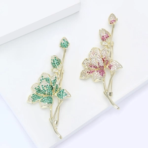 Elegant floral flower brooch with micro-paved zircons and gold plating in two colors