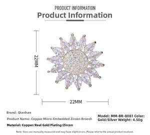 Detalle del broche de girasol de 22mm con circonitas engastadas en oro y plata