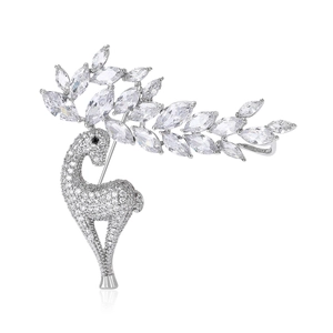 Elegant deer brooch with silver-tone base and sparkling zircon crystals on white background