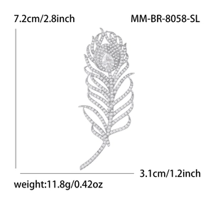 Élégante broche plume argentée avec oxydes de zirconium, taille 7,2 cm sur 3,1 cm