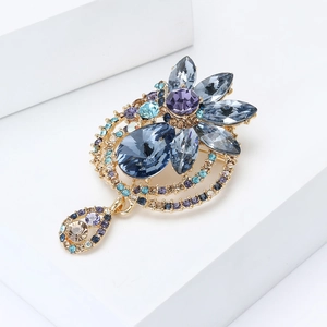 Elegant vintage gold water-drop brooch with colorful crystals and teardrop pendant