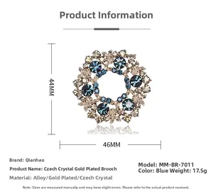 Detailed view of blue crystal wreath brooch showing 44mm by 46mm size and 17.5g weight