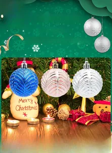 Detail of Christmas balls with 3D leaf texture in blue, pink, and silver with hanging loops
