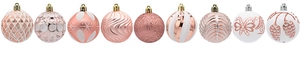 Detail of mixed rose gold and white Christmas balls with glitter and painted patterns