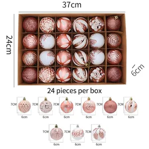 Detail of 24pcs pink and white Christmas ornaments with glitter patterns and 6cm diameter