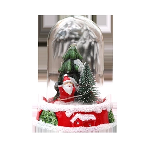 Christmas glass dome decoration with Santa Claus and resin snow scene base