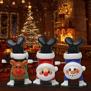 Christmas wind-up toys featuring Santa, Reindeer, and Snowman in handstand pose