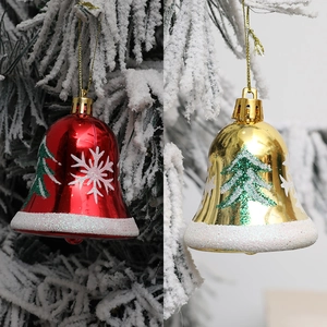 Christmas bell ornaments set with festive snowflake patterns in red and gold finish