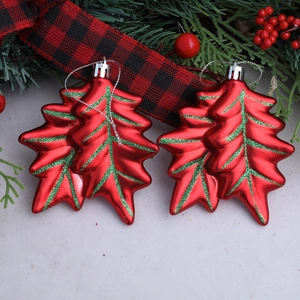 Red leaf Christmas ball ornaments with green glitter veins for festive tree decoration