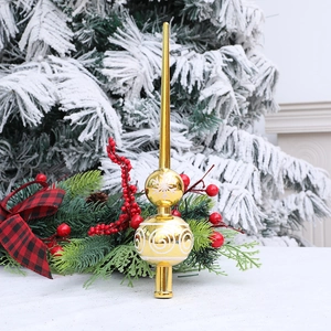 Golden Christmas tree topper with white snowflake pattern and vintage tower shape