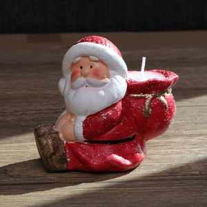 Santa Claus ceramic candle holder ornament with red gift bag design for Christmas decor