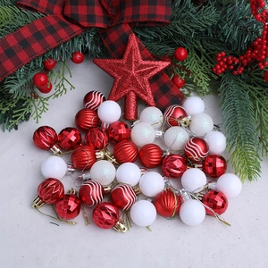 Festive red and white Christmas ball ornament set with star topper and glitter finishes