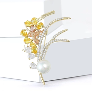Elegant wheat ear flower brooch with colorful zircon crystals and white pearl on gold base