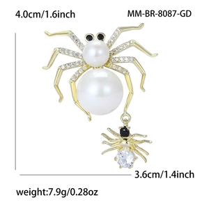 Golden spider brooch featuring white pearls and zircon accents for Halloween fashion