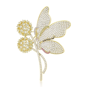 Elegante spilla a farfalla e dente di leone in oro con cristalli di zircone colorati