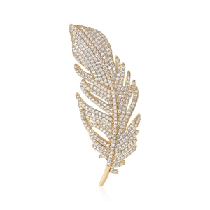 Elegant gold plated feather brooch with white zircon inlay on a white background
