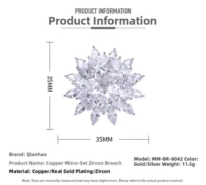 Macro detail of snowflake zircon brooch showing 35mm x 35mm dimensions and metallic texture