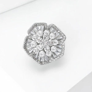 Elegant floral zirconia brooch with sparkling crystal petals and silver metal finish