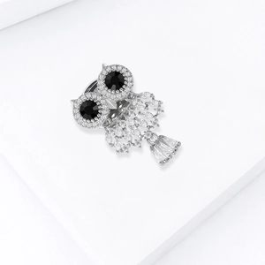 Exquisite silver owl brooch with micro-pave white zircons and black gemstone eyes