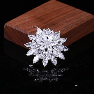 Elegant snowflake brooch with marquise-cut zircon crystals on silver base floral design
