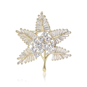Elegant gold maple leaf brooch with micro-pave zircons and radiant crystal sparkles