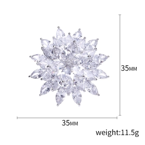 Elegant silver snowflake brooch with marquise-cut zircons for suit and dress accessories