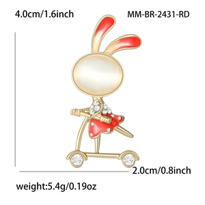 Cute rabbit on scooter brooch with cat eye stone and red polka dot enamel detail