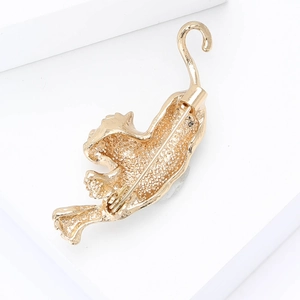 Detail of tiger brooch back with secure pin clasp and matte alloy finish texture