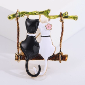 Broche chat en émail noir et blanc avec branche dorée pour accessoires de mode