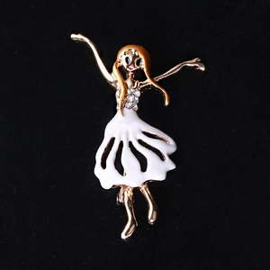 Elegant ballet dancer brooch with white enamel skirt and sparkling crystals on gold plating