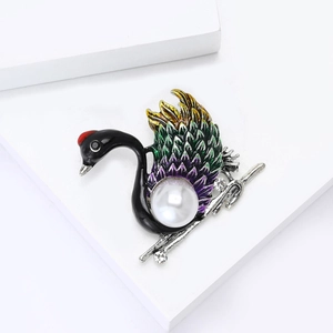 Fashionable colorful enamel swan brooch with large white pearl on silver branch base