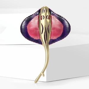 Detail of manta ray brooch with pink and purple enamel on a golden metal base