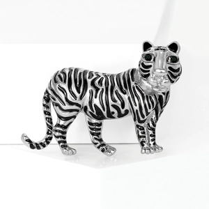 Vintage silver tiger brooch with black enamel stripes and green gemstone eyes for suits