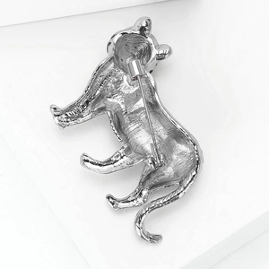 Detailed back view of the vintage tiger brooch showing sturdy pin clasp and silver finish