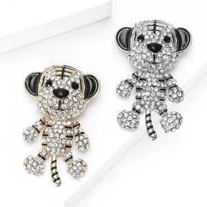 Sparkling tiger brooches with inlaid rhinestones in gold and silver tones for suits