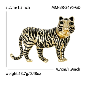 Vintage tiger brooch with gold plating and green gemstone eyes for men's suits