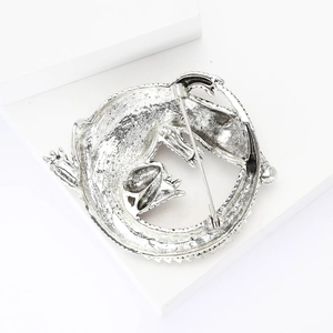 Detailed back view of vintage silver crocodile brooch showing pin mechanism and hollow texture