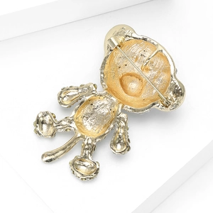 Back view of cute gold-plated bear brooch with secure pin clasp and rhinestone details