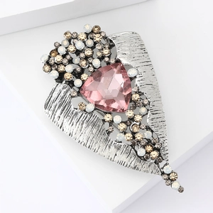 Vintage silver alloy brooch with large pink triangle gemstone and champagne rhinestones