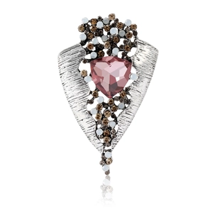 Vintage silver alloy brooch with triangular pink gemstone and rhinestone accents